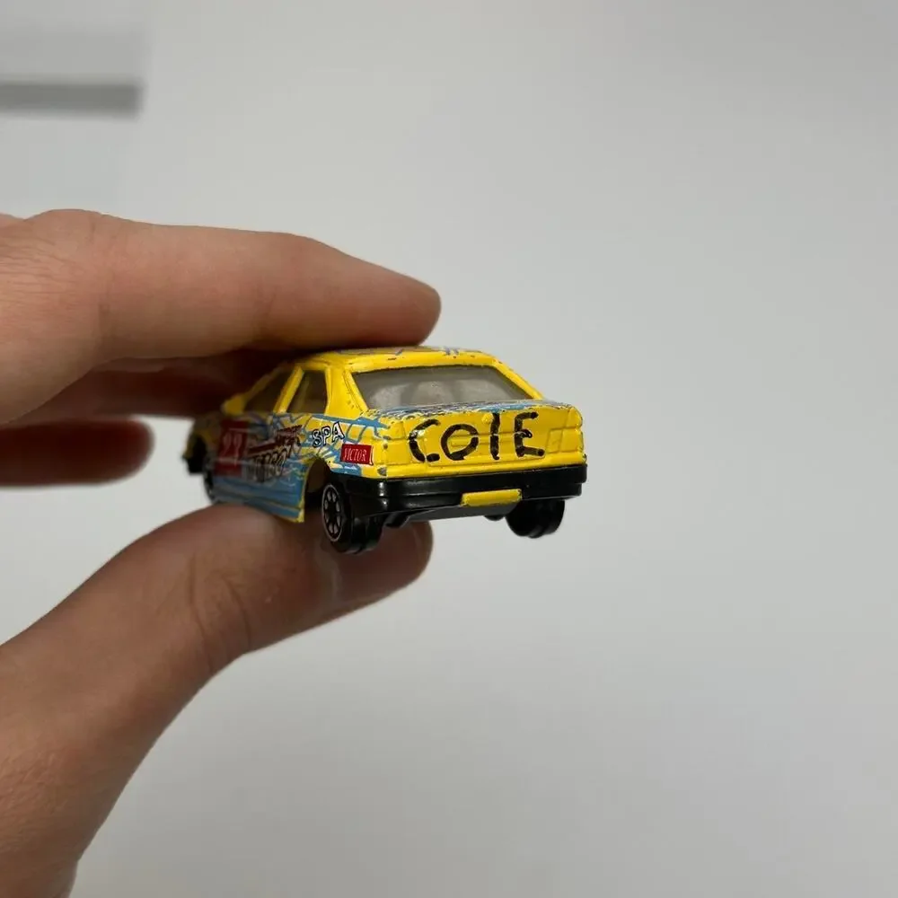 Vintage 90s Pioneer BMW 3 Series Turbo 1:64 Diecast Yellow Mini Car